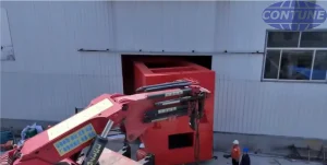 testing machine of 21m long exits the workshop with the help of cranes